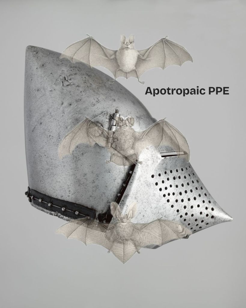 A silver hounskull helmet with a pointed nose on a grey background. Three translucent bats are positioned vertically over the helmet